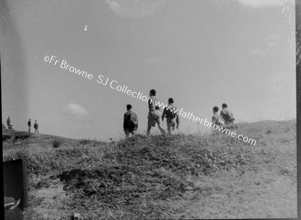 HIKERS ON THE CLIFFS